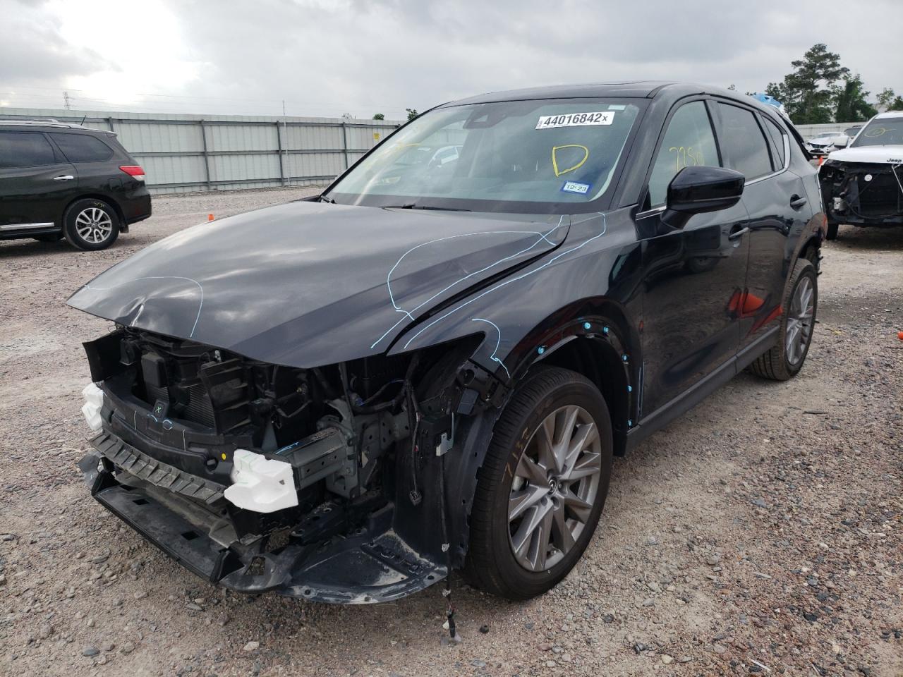Photo 2 from auction – 2021 MAZDA CX-5 GRAND with VIN JM3KFADM3M0471907