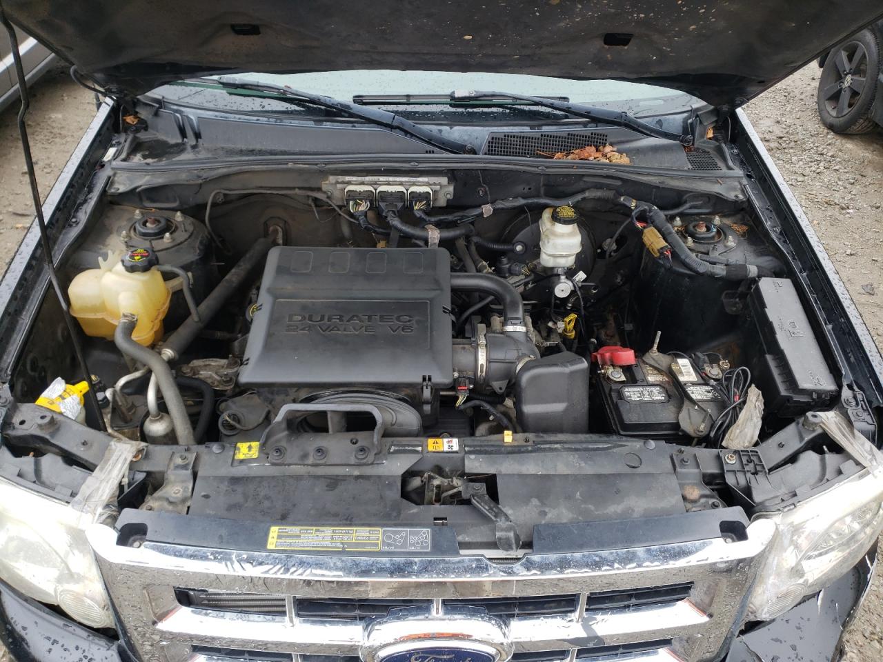 Photo 7 from auction – 2009 FORD ESCAPE LIM with VIN 1FMCU94G39KB70217