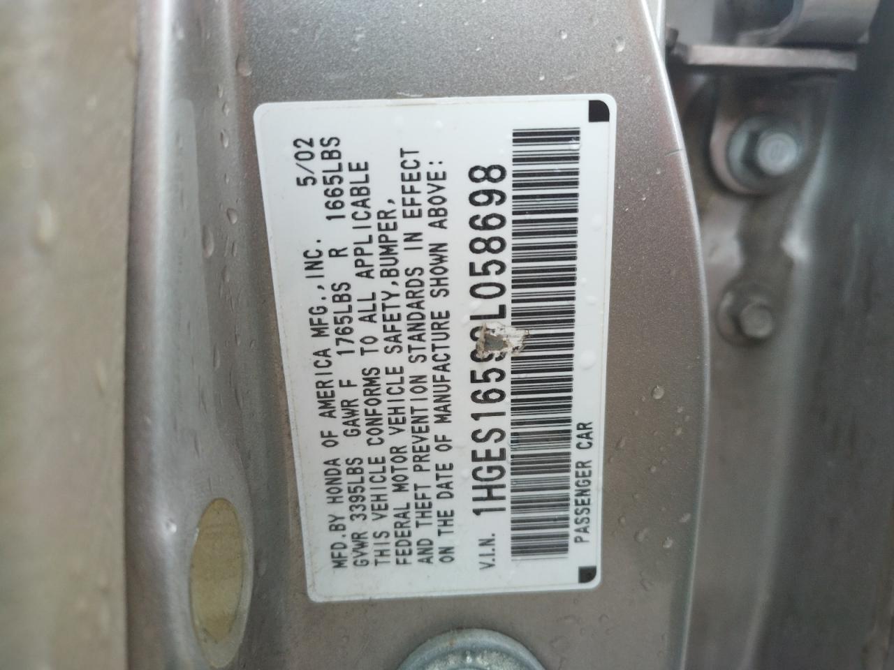 Photo 10 from auction – 2002 HONDA CIVIC LX with VIN 1HGES16592L058698