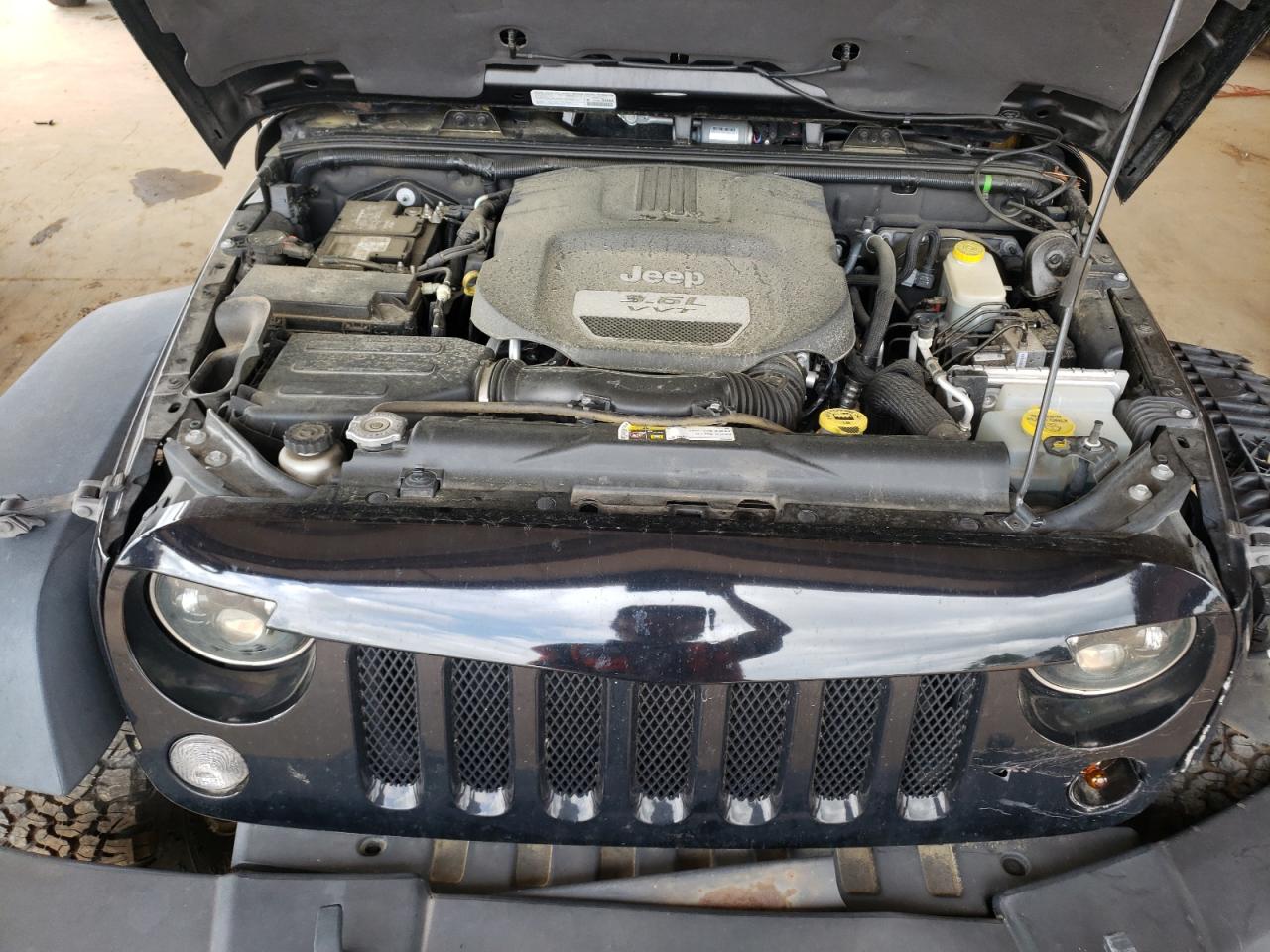 Photo 7 from auction – 2014 JEEP WRANGLER U with VIN 1C4BJWFG5EL179011