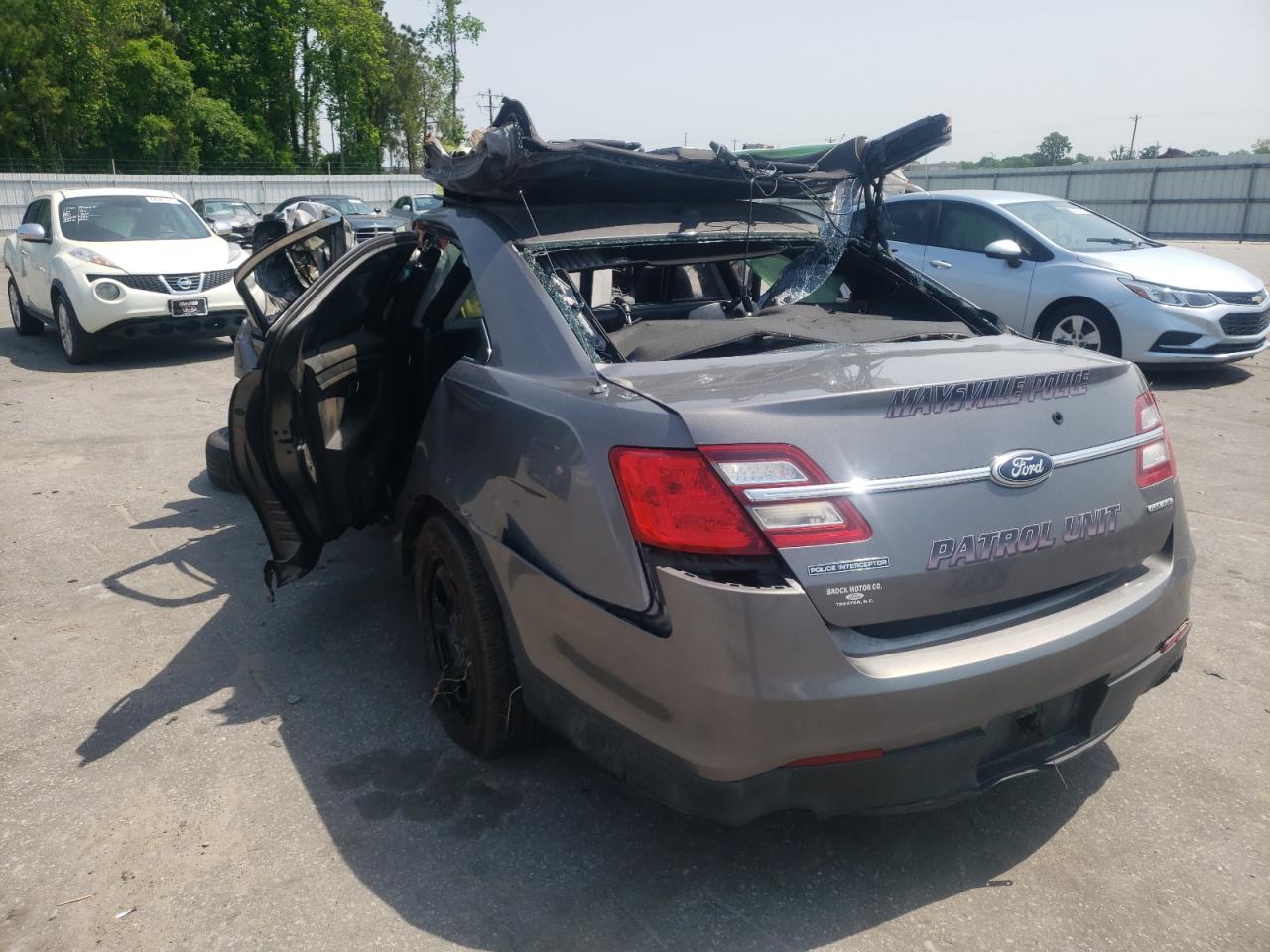 Photo 3 from auction – 2015 FORD TAURUS POL with VIN 1FAHP2L8XFG109096