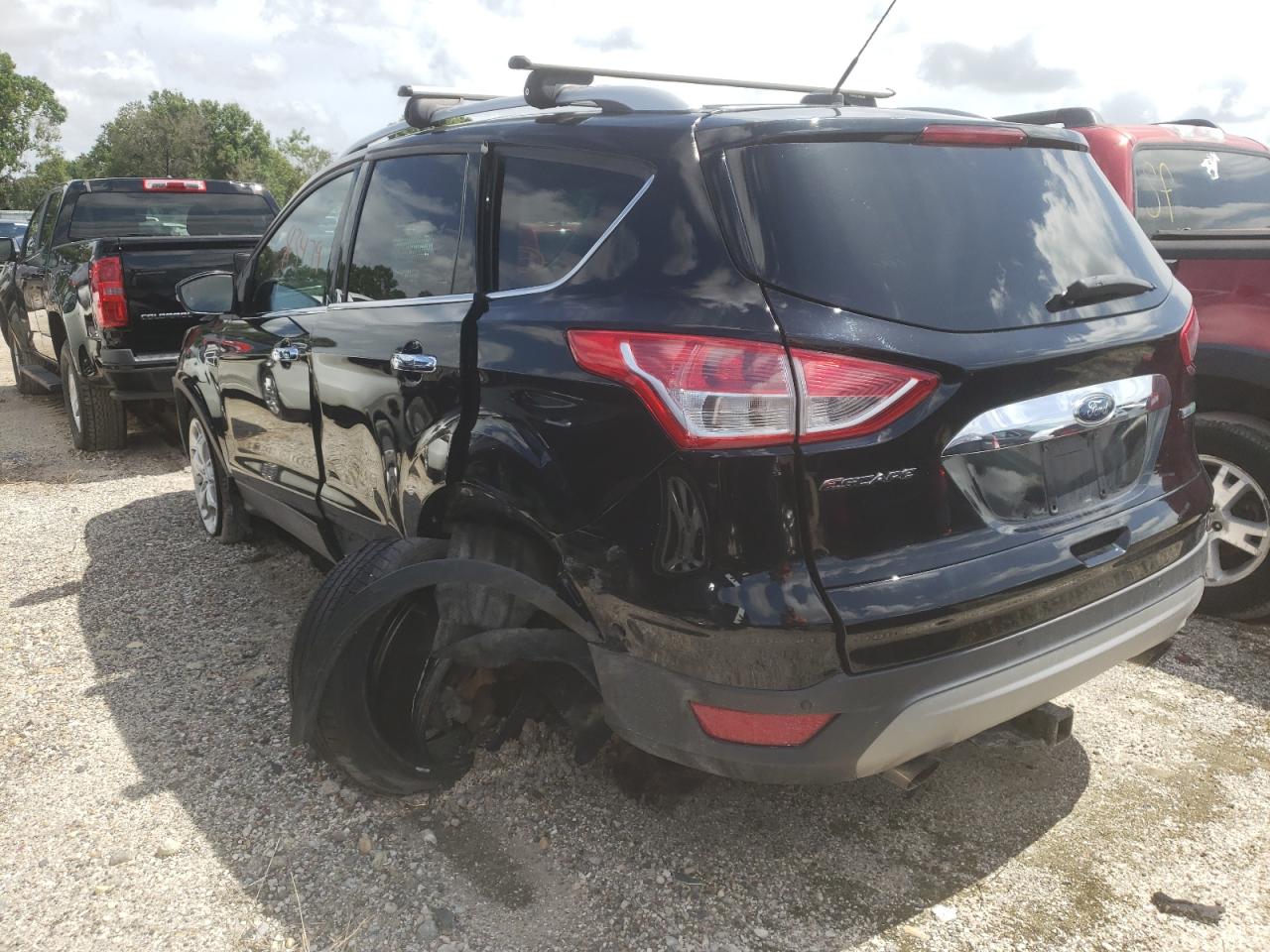 Photo 3 from auction – 2016 FORD ESCAPE TIT with VIN 1FMCU0J99GUA03623