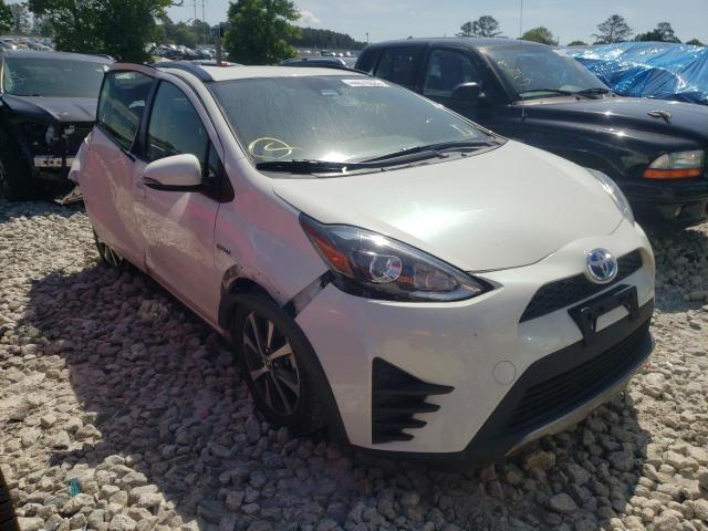 TOYOTA PRIUS C 2018 with VIN JTDKDTB37J1614741 - Photo from auction