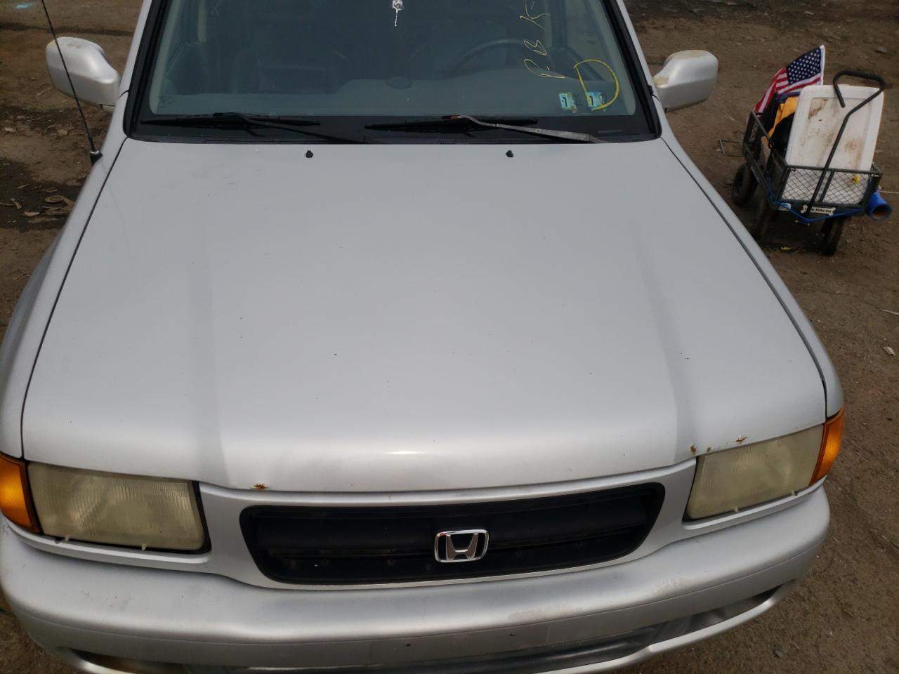 Photo 7 from auction – 1999 HONDA PASSPORT E with VIN 4S6CM58W2X4423904
