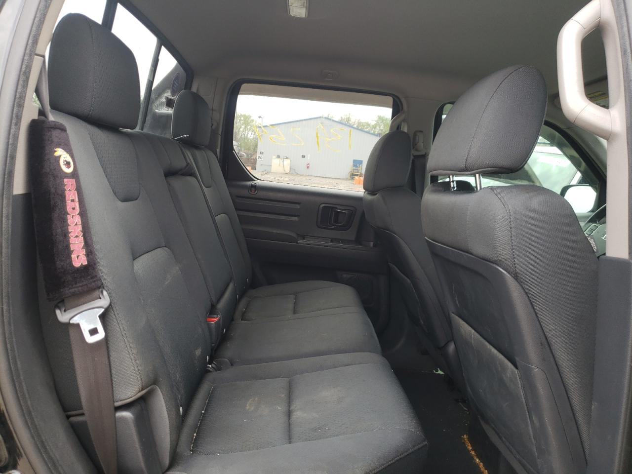 Photo 6 from auction – 2013 HONDA RIDGELINE with VIN 5FPYK1F71DB004550