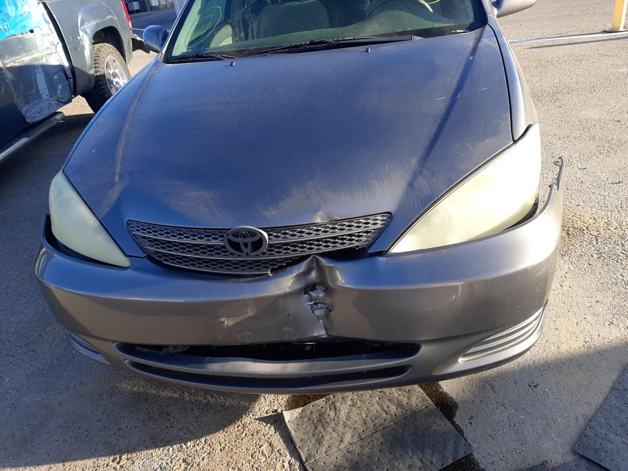 Photo 9 from auction – 2004 TOYOTA CAMRY LE with VIN 4T1BE32K64U883378