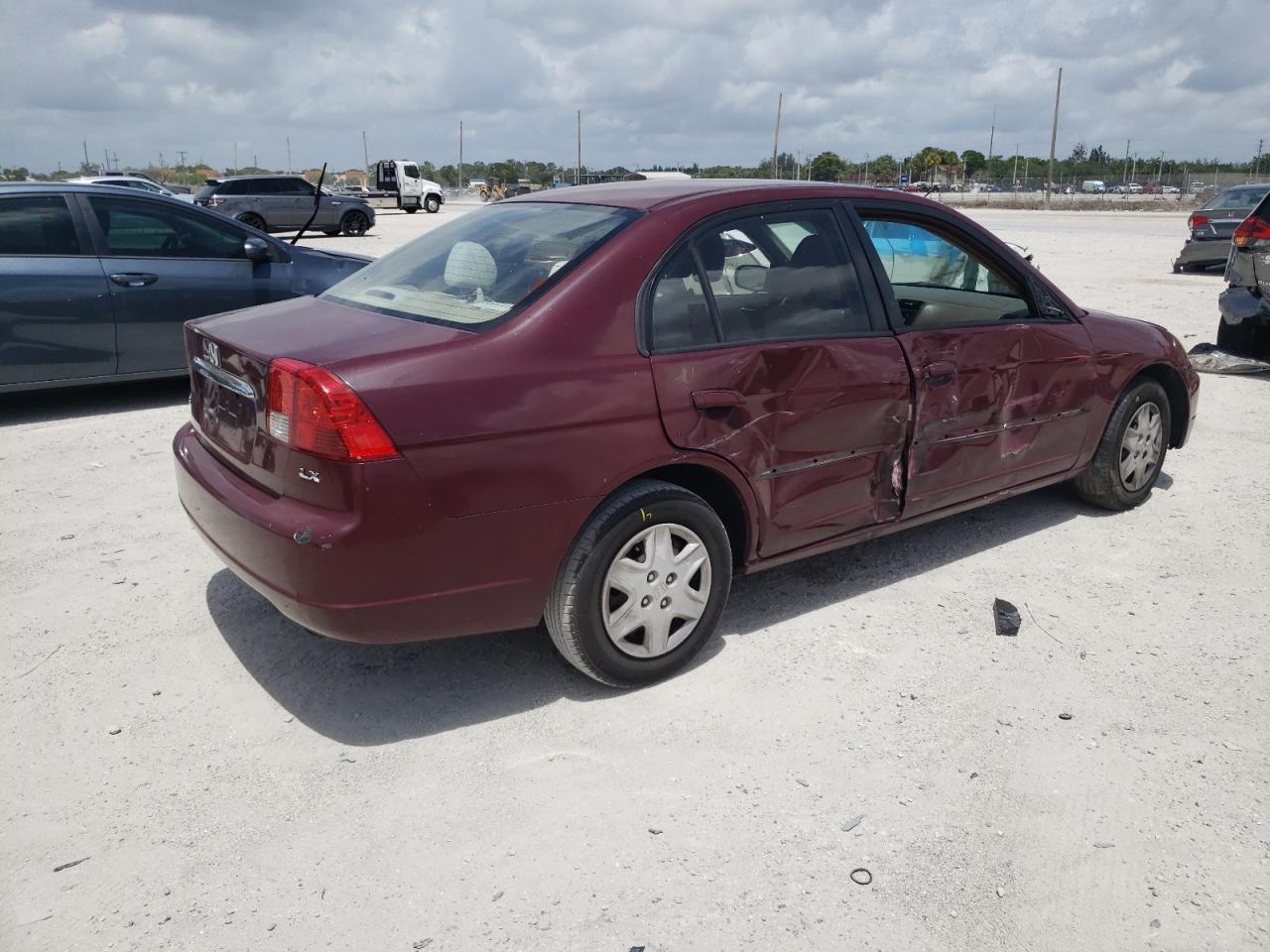Photo 4 from auction – 2003 HONDA CIVIC LX with VIN 2HGES16563H618272
