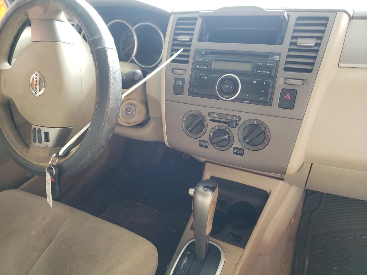 Photo 9 from auction – 2010 NISSAN VERSA S with VIN 3N1BC1AP4AL384373