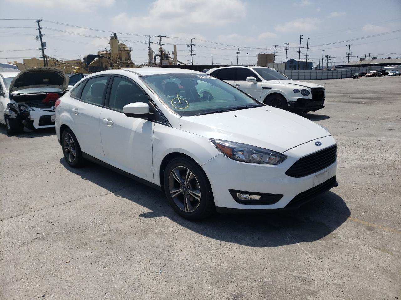 Фото 1 с аукциона – 2018 FORD FOCUS SE с VIN 1FADP3FE9JL270643