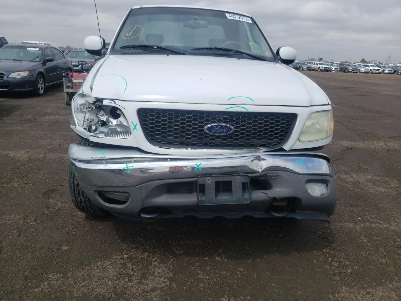 Photo 9 from auction – 2002 FORD F150 with VIN 1FTRX18L82NA64218