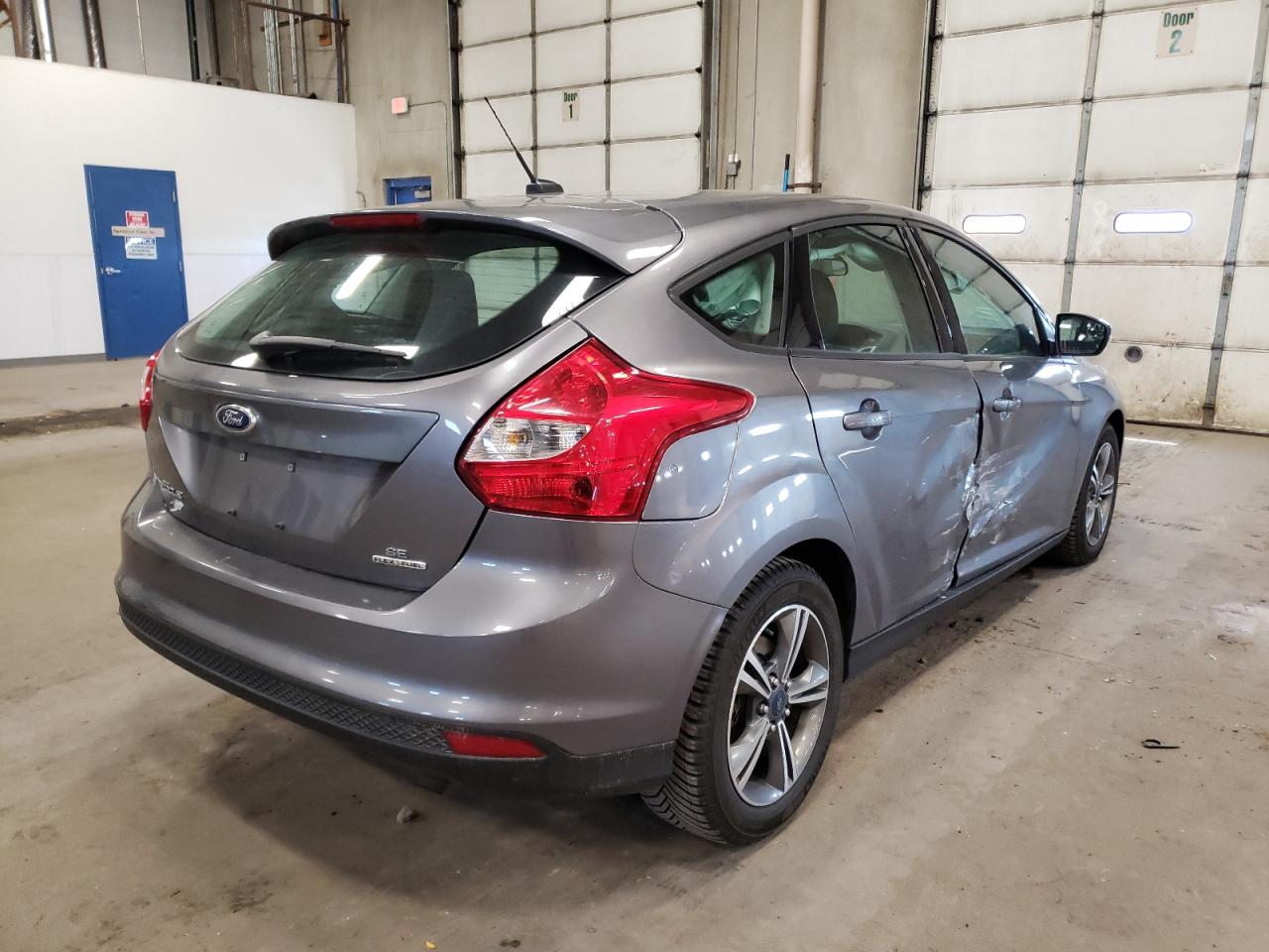 Photo 4 from auction – 2014 FORD FOCUS SE with VIN 1FADP3K2XEL463577
