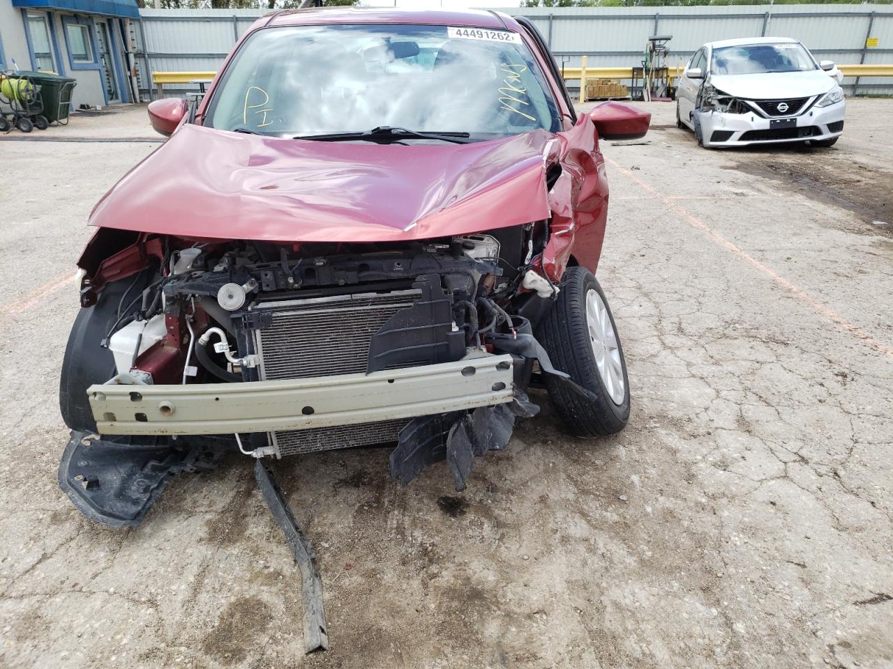 Photo 9 from auction – 2018 NISSAN VERSA S with VIN 3N1CN7AP8JL803682