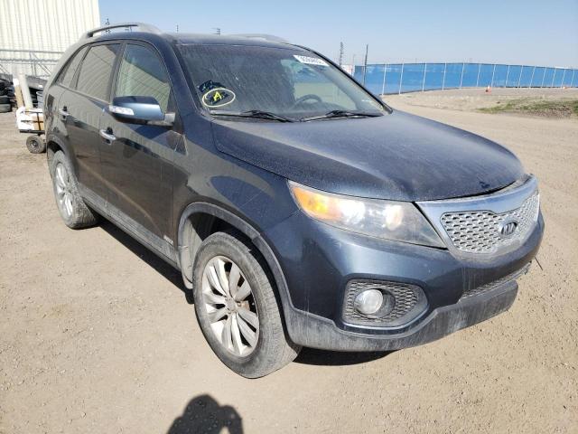 KIA SORENTO EX 2011 with VIN 5XYKUDA22BG072299 - Photo from auction