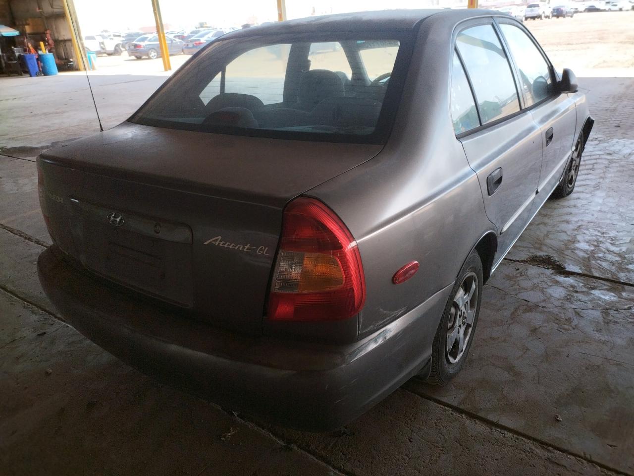 Photo 4 from auction – 2002 HYUNDAI ACCENT GL with VIN KMHCG45C52U344398