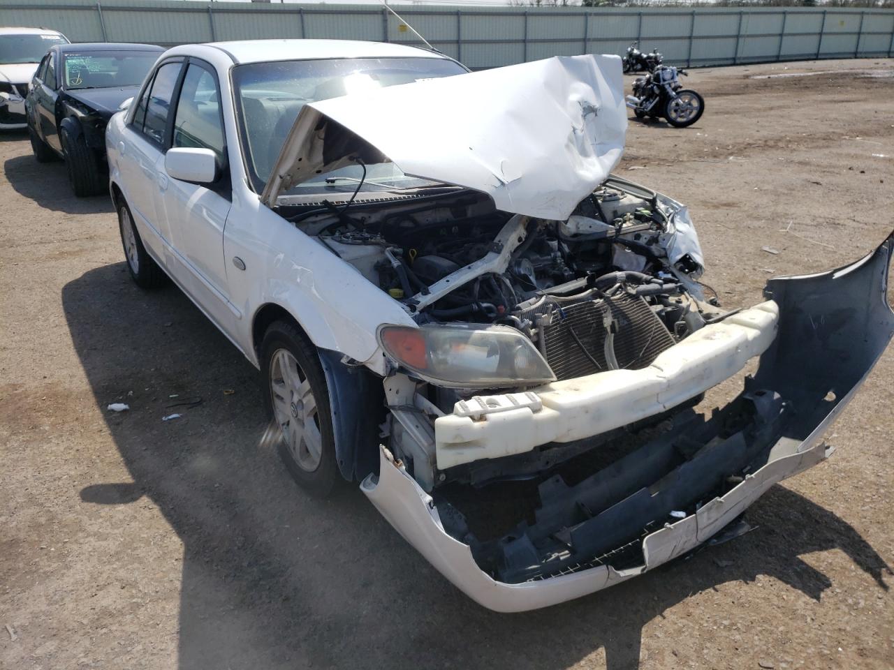 MAZDA PROTEGE DX 2003 with VIN JM1BJ225230185375 - Photo from auction