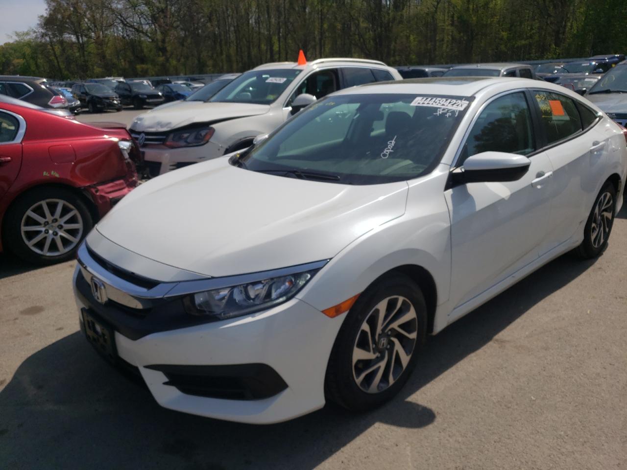 Photo 2 from auction – 2018 HONDA CIVIC EX with VIN 19XFC2F78JE205317
