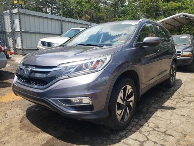 Photo 2 from auction – 2016 HONDA CRV with VIN 5J6RM3H99GL009492