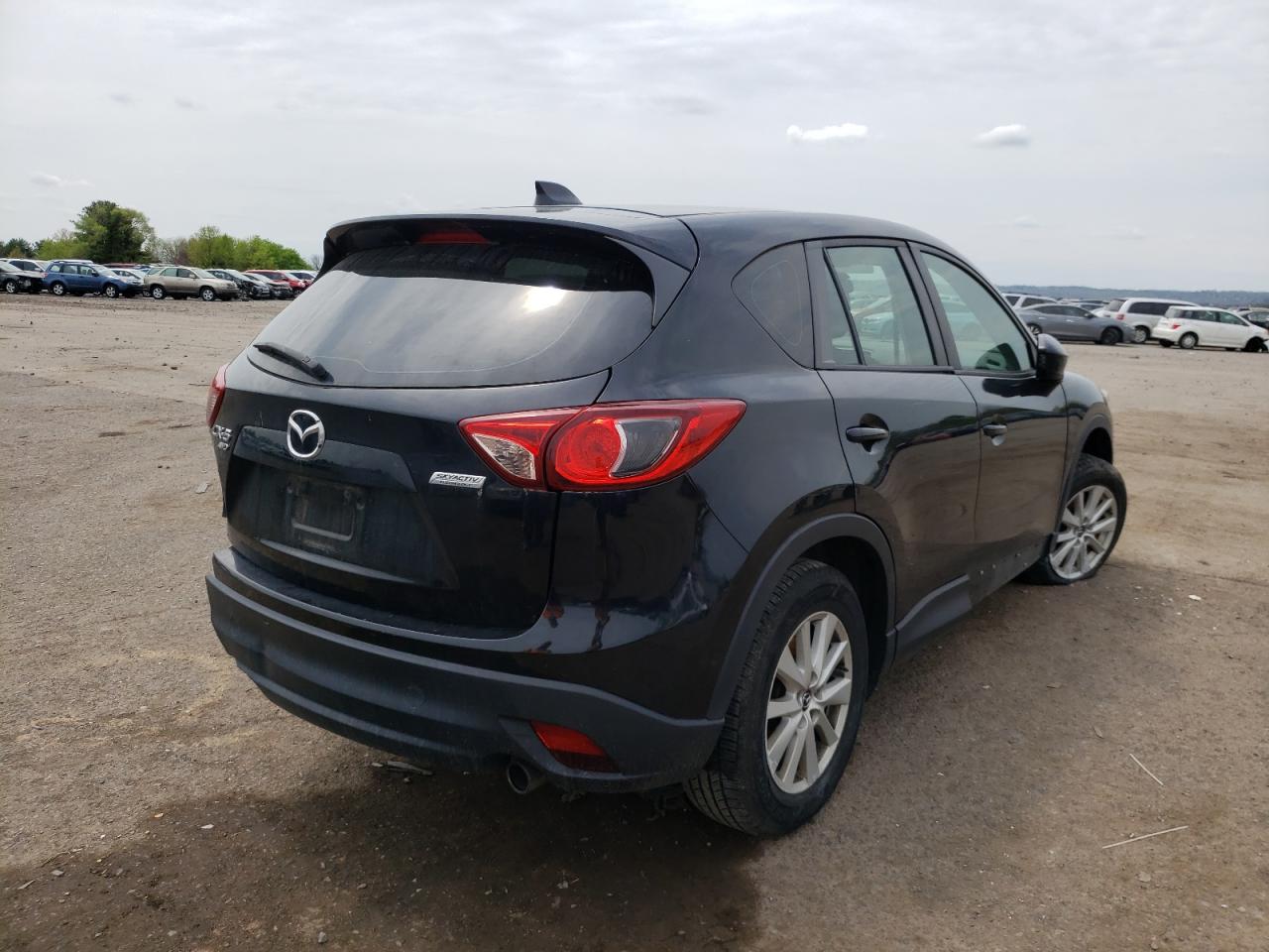 Photo 4 from auction – 2014 MAZDA CX-5 SPORT with VIN JM3KE4BEXE0377007