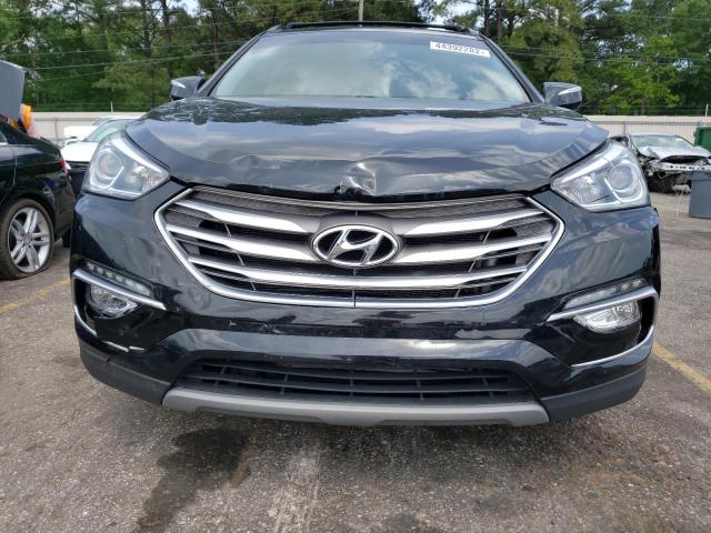 Photo 9 from auction – 2018 HYUNDAI SANTA FE S with VIN 5NMZU3LB3JH103764