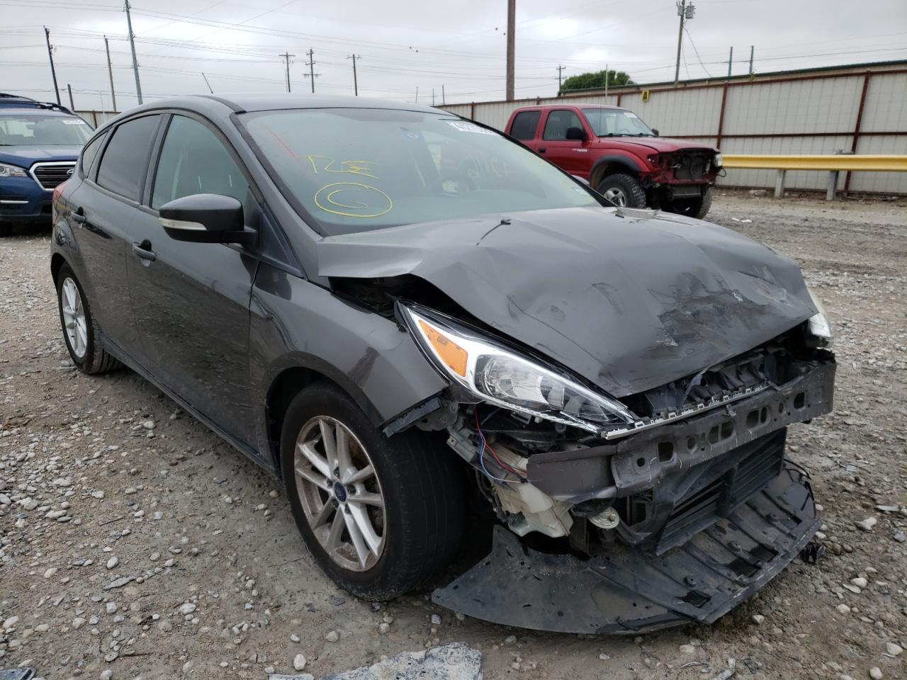FORD FOCUS SE 2015 with VIN 1FADP3K25FL230854 - Photo from auction