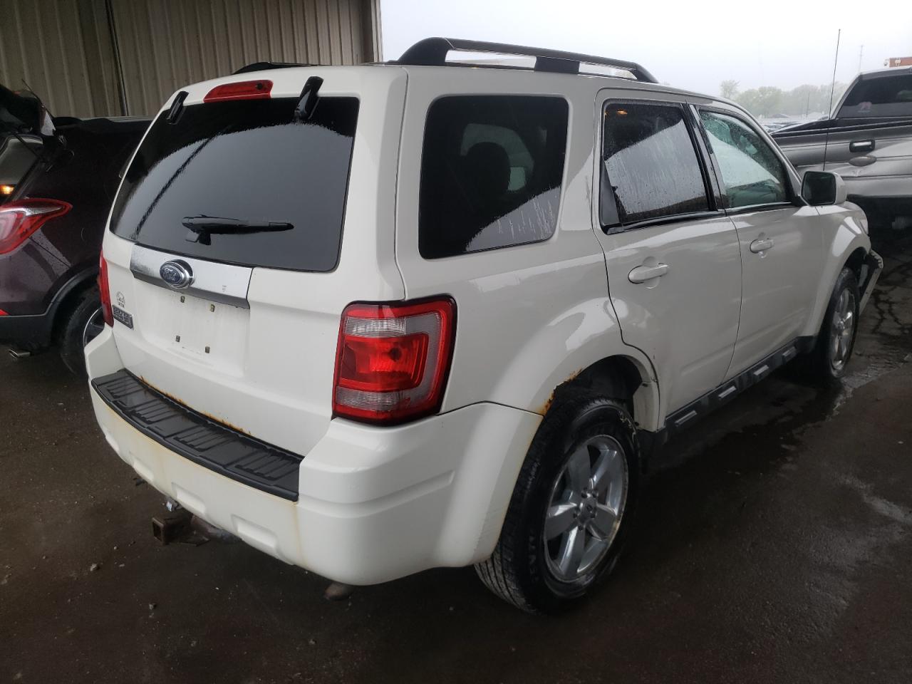 Photo 4 from auction – 2009 FORD ESCAPE LIM with VIN 1FMCU04759KC97434