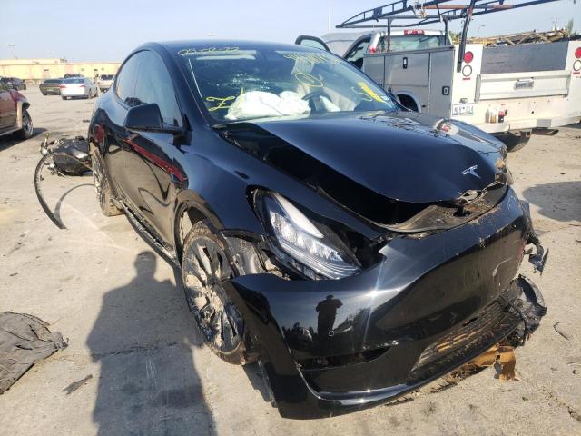 TESLA MODEL Y 2021 with VIN 5YJYGDEE7MF208149 - Photo from auction