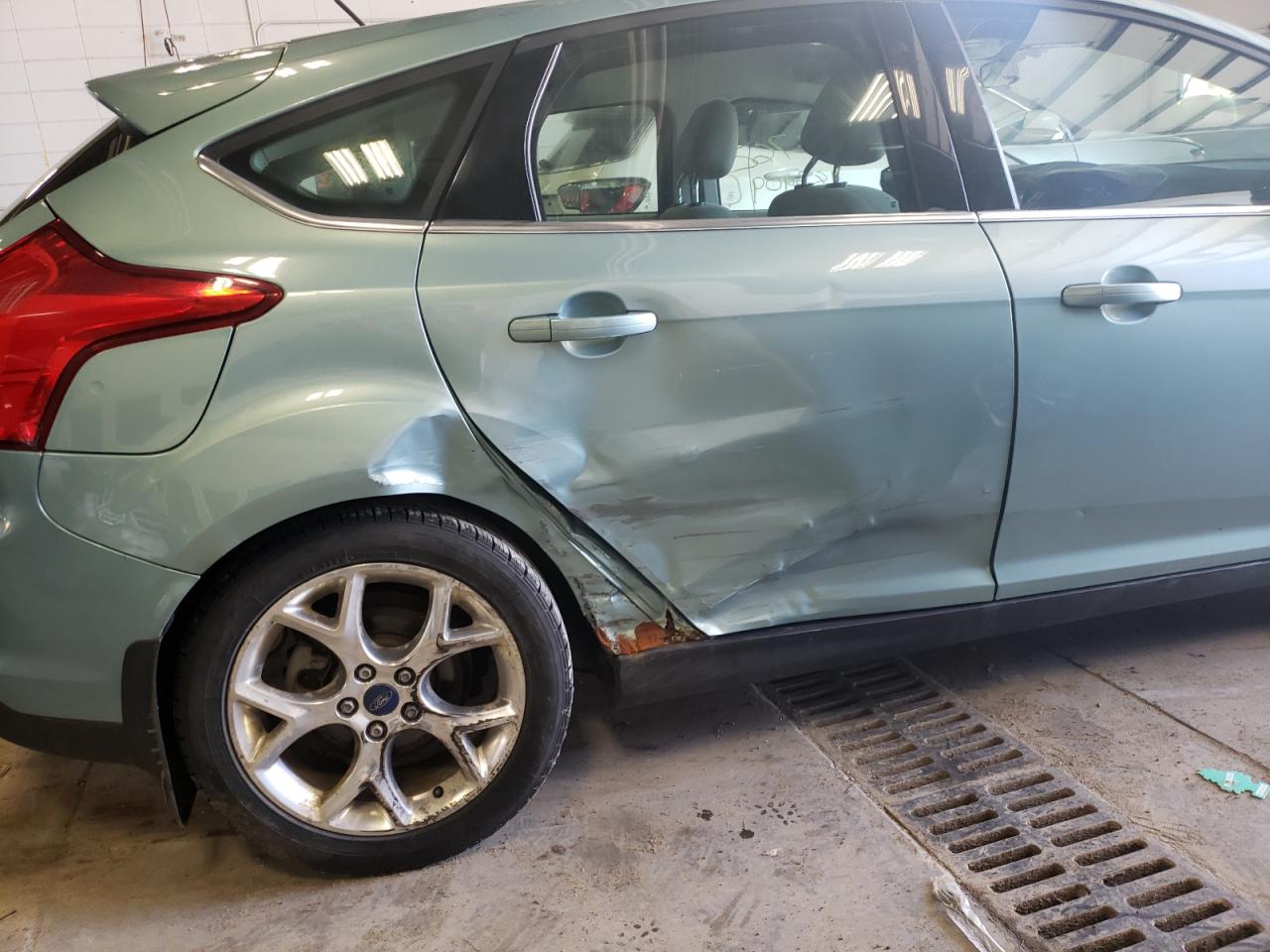 Photo 9 from auction – 2012 FORD FOCUS SEL with VIN 1FAHP3M26CL226502