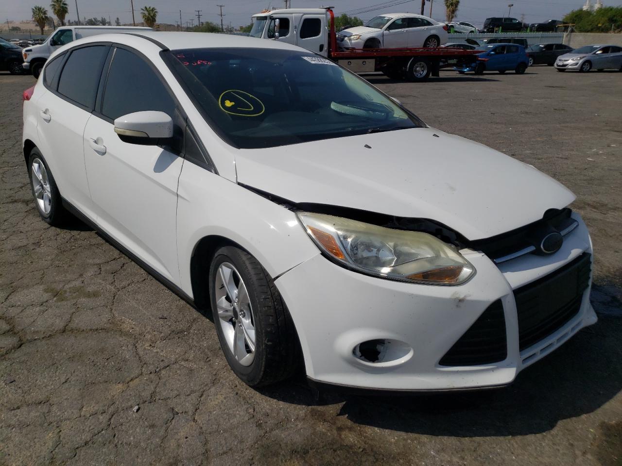 FORD FOCUS SE 2013 with VIN 1FADP3K27DL107845 - Photo from auction