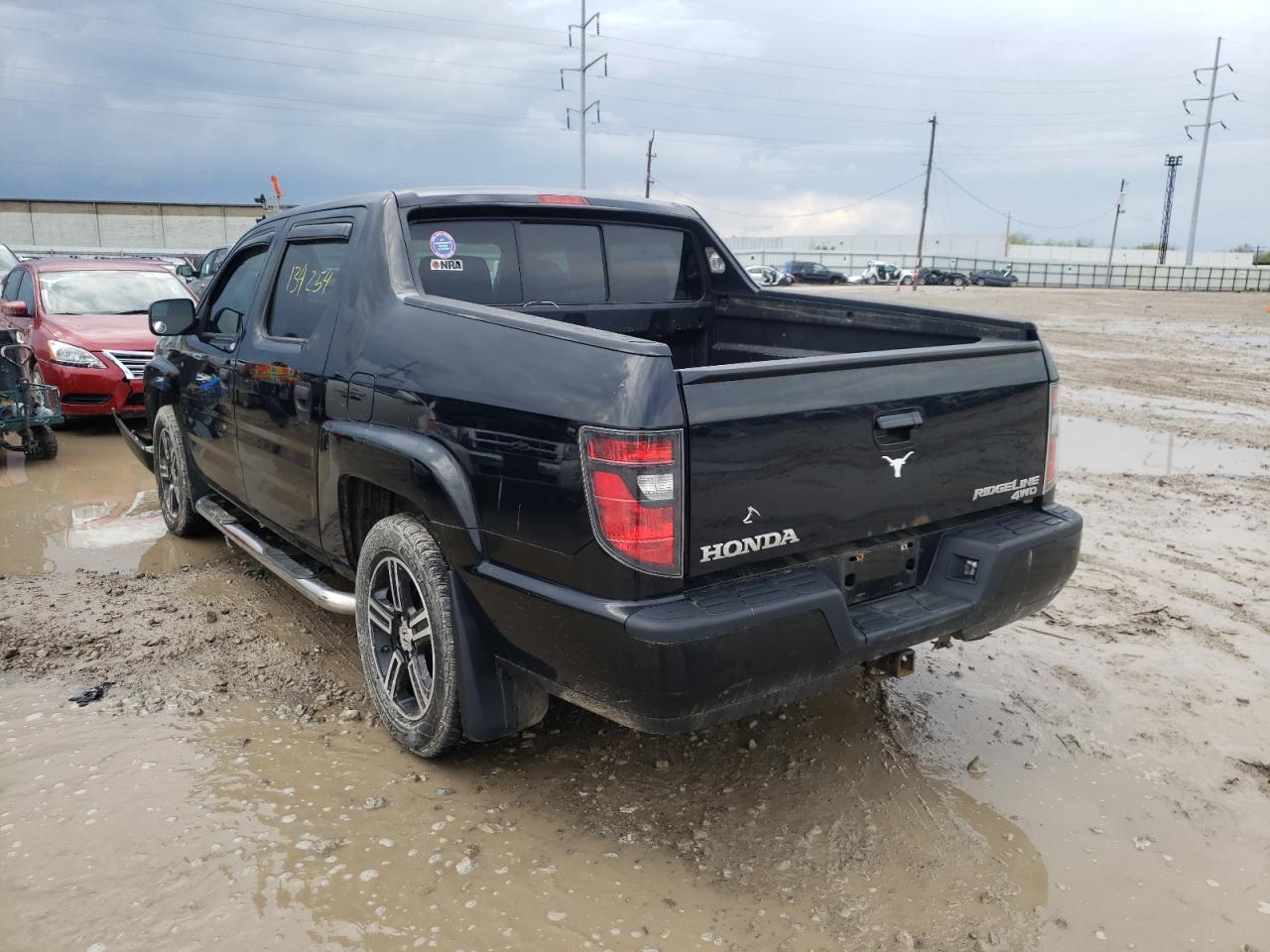Photo 3 from auction – 2013 HONDA RIDGELINE with VIN 5FPYK1F71DB004550