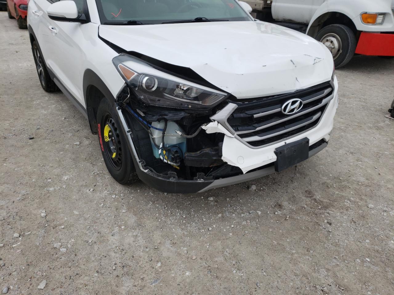 Photo 9 from auction – 2017 HYUNDAI TUCSON LIM with VIN KM8J3CA26HU573353