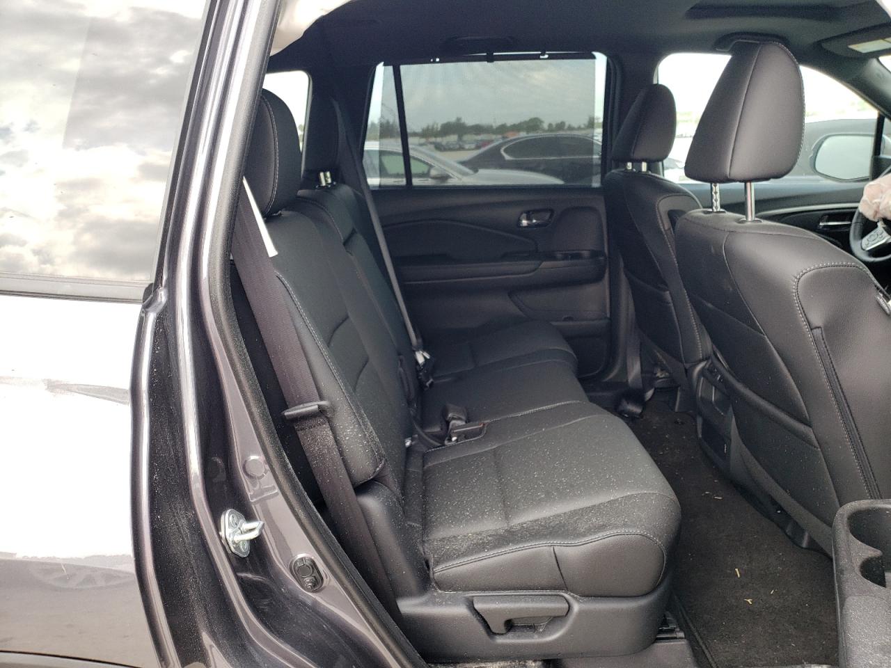 Photo 6 from auction – 2021 HONDA PASSPORT E with VIN 5FNYF7H5XMB013078