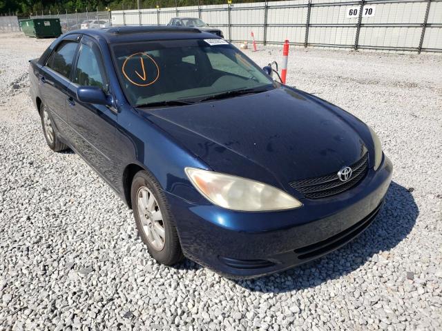 TOYOTA CAMRY LE 2002 with VIN 4T1BE32K32U638499 - Photo from auction