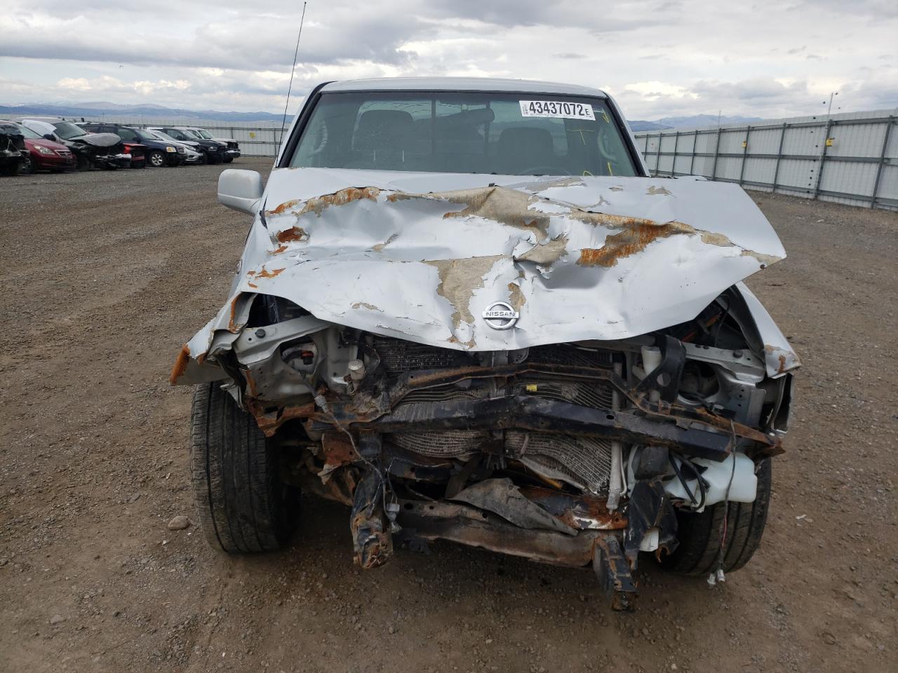 Photo 9 from auction – 2003 NISSAN FRONTIER K with VIN 1N6ED26Y23C411855
