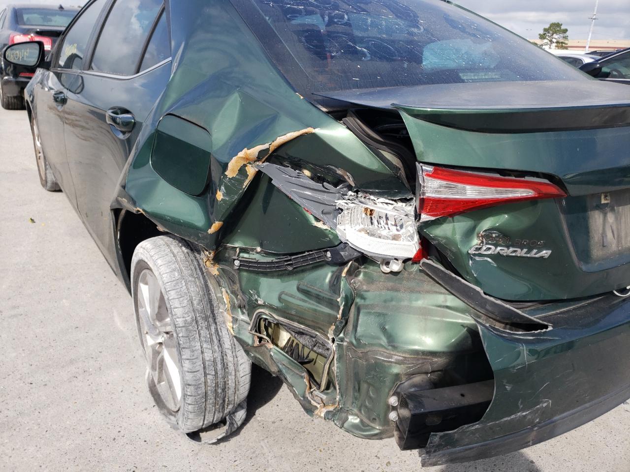 Photo 9 from auction – 2014 TOYOTA COROLLA EC with VIN 5YFBPRHE7EP030182