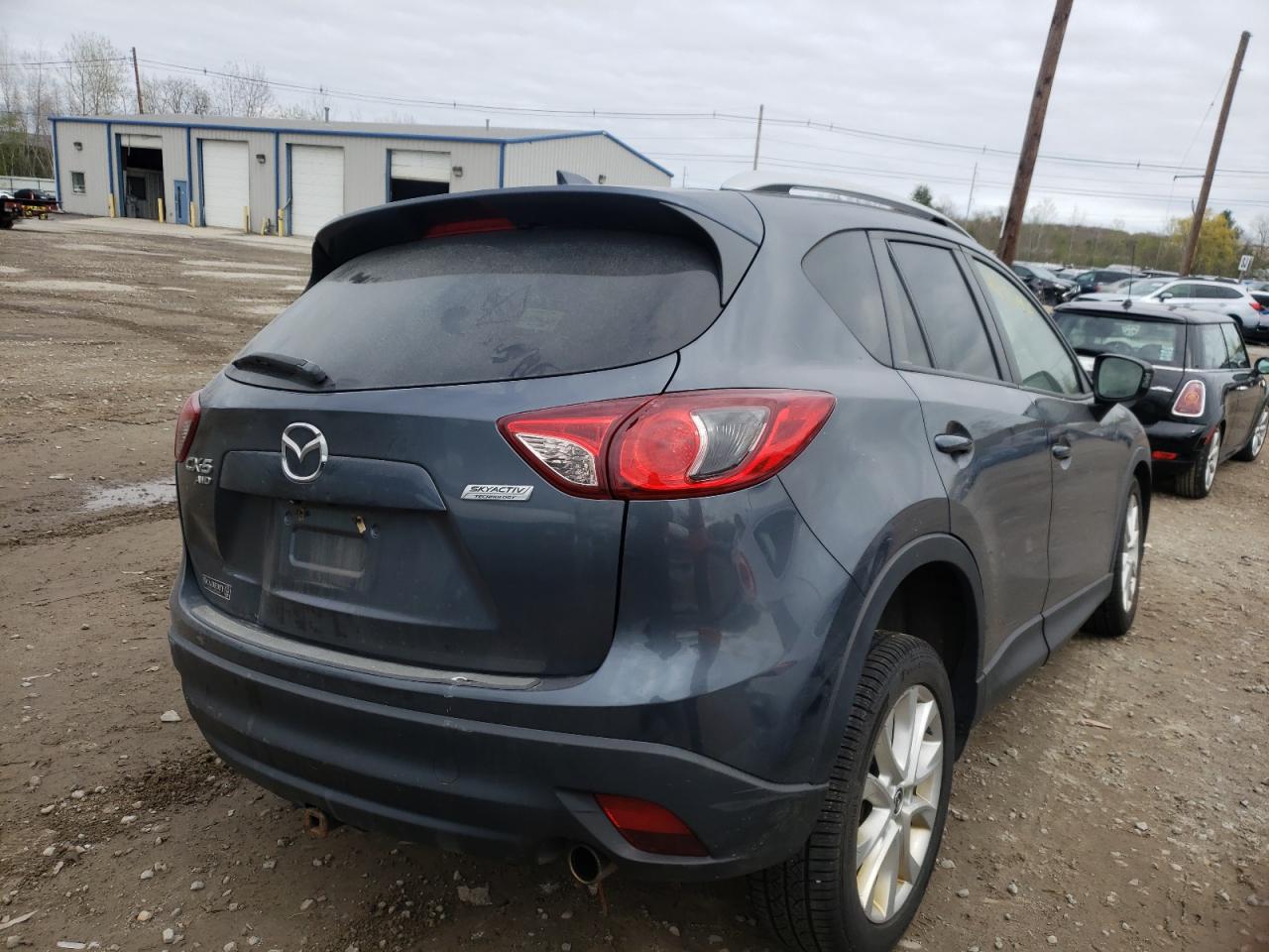 Photo 4 from auction – 2013 MAZDA CX-5 GT with VIN JM3KE4DE0D0151604