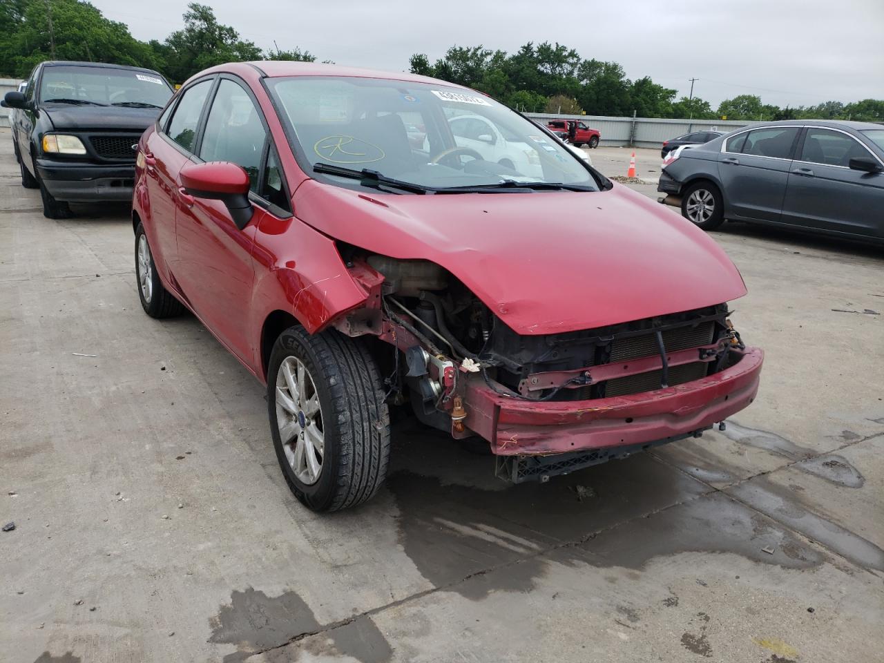 FORD FIESTA SE 2012 with VIN 3FADP4BJ0CM198256 - Photo from auction