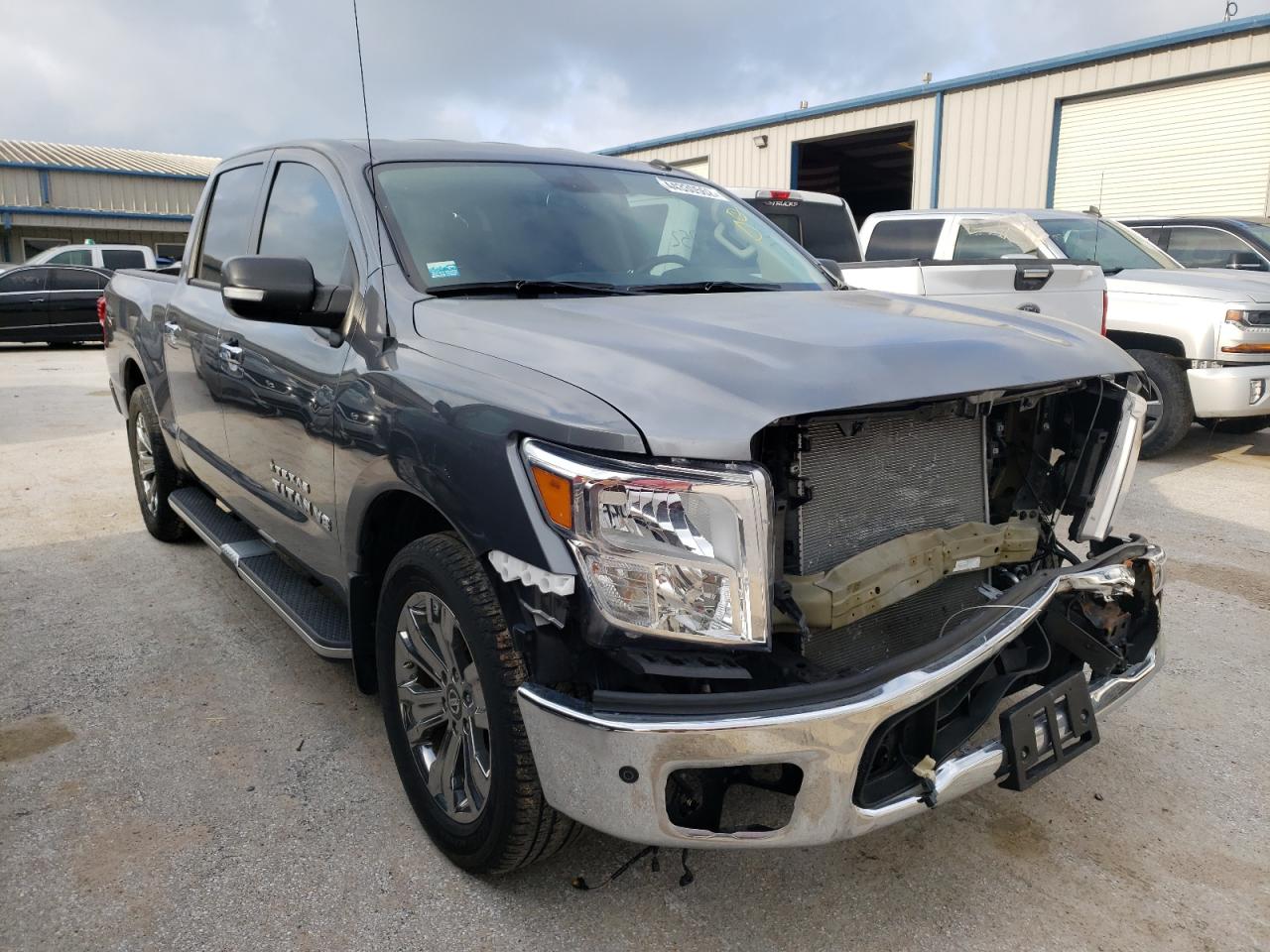 NISSAN TITAN PLAT 2019 with VIN 1N6AA1E64KN504591 - Photo from auction
