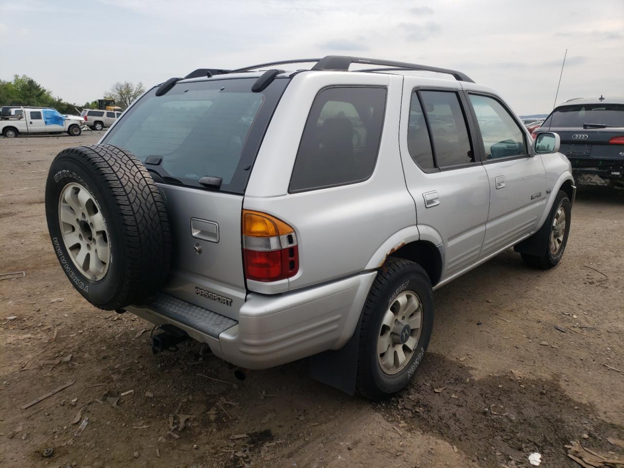 Photo 4 from auction – 1999 HONDA PASSPORT E with VIN 4S6CM58W2X4423904