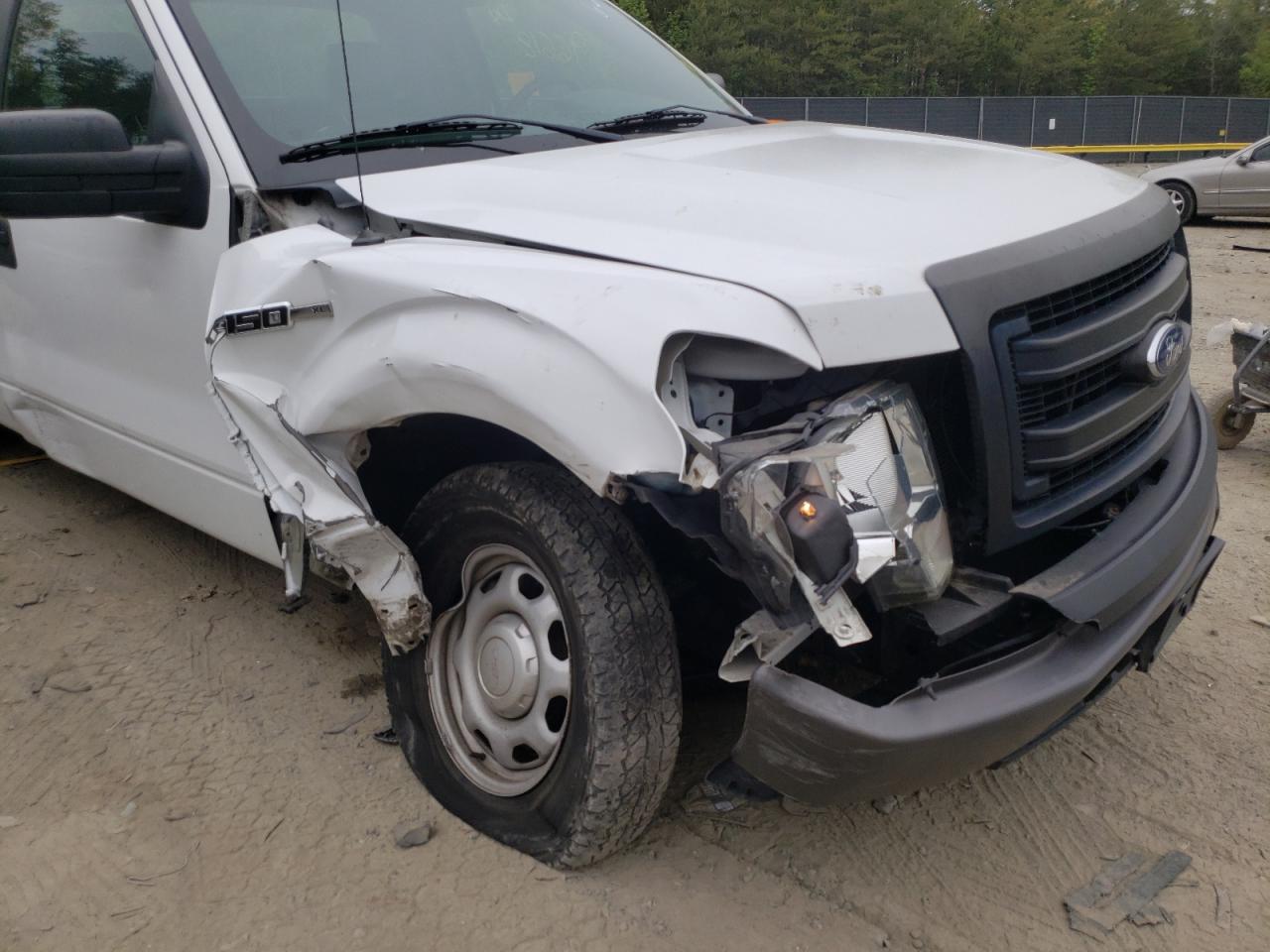 Photo 19 from auction – 2014 FORD F150 with VIN 1FTMF1CM4EKG36582