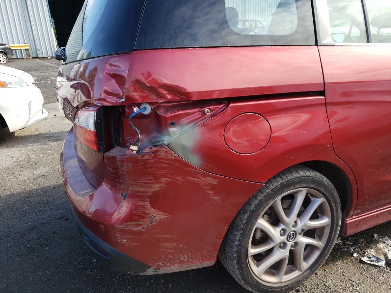 Photo 9 from auction – 2013 MAZDA 5 with VIN JM1CW2CL9D0150448
