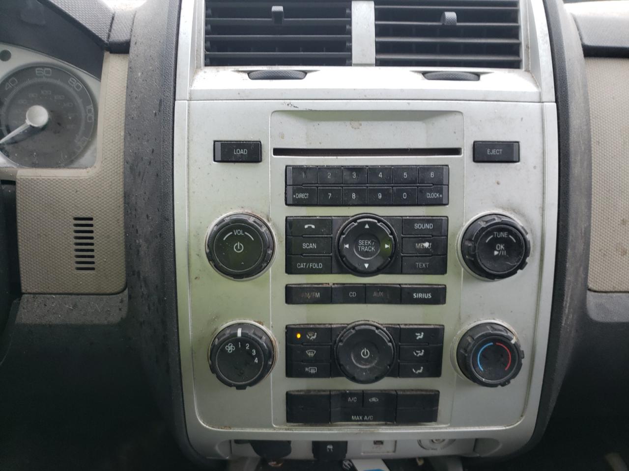 Photo 9 from auction – 2009 MERCURY MARINER with VIN 4M2CU81719KJ22681