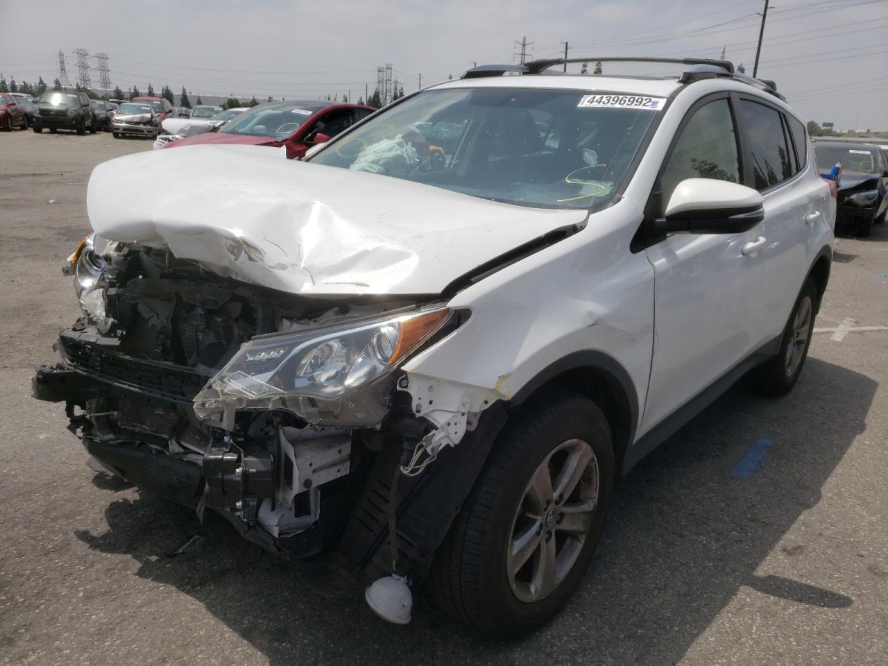 Photo 2 from auction – 2015 TOYOTA RAV4 XLE with VIN JTMWFREV2FD075754