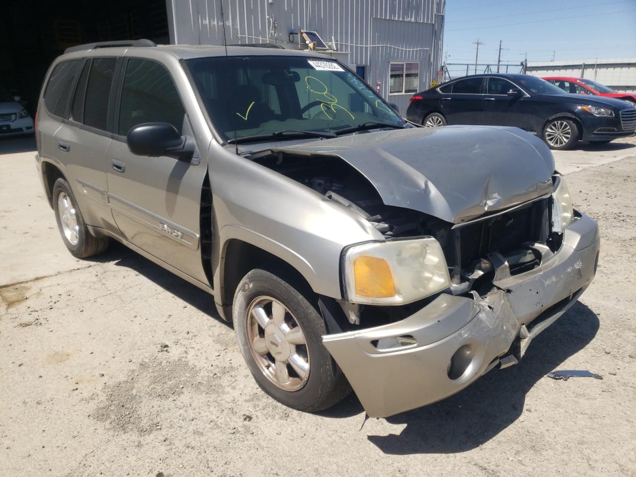 GMC ENVOY 2003 with VIN 1GKDT13S132362346 - Photo from auction