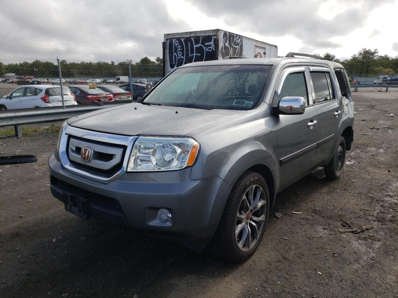 Photo 2 from auction – 2009 HONDA PILOT LX with VIN 5FNYF48279B026351