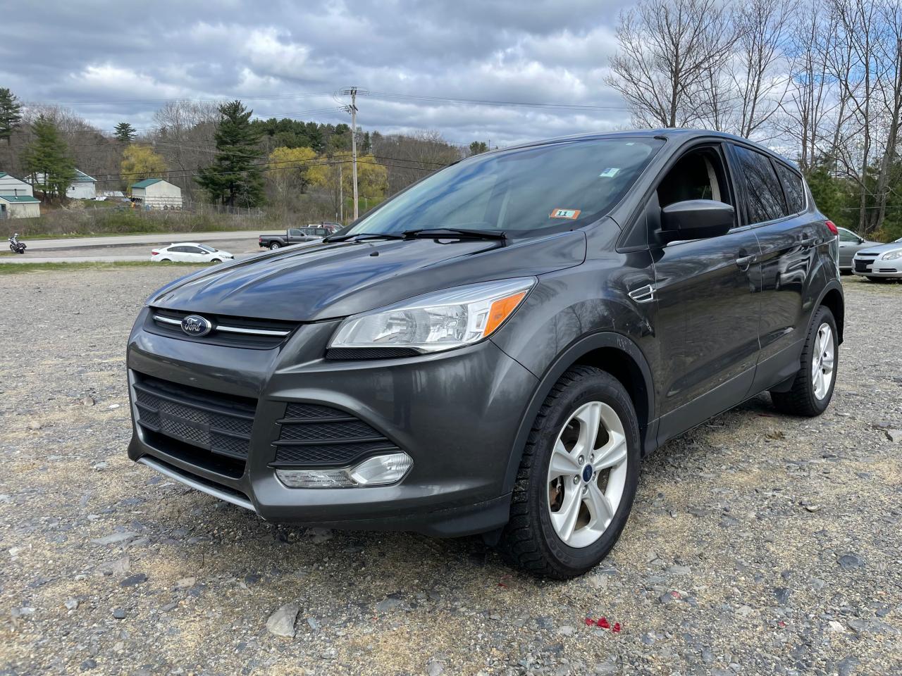 Photo 2 from auction – 2016 FORD ESCAPE SE with VIN 1FMCU9GX2GUB09941