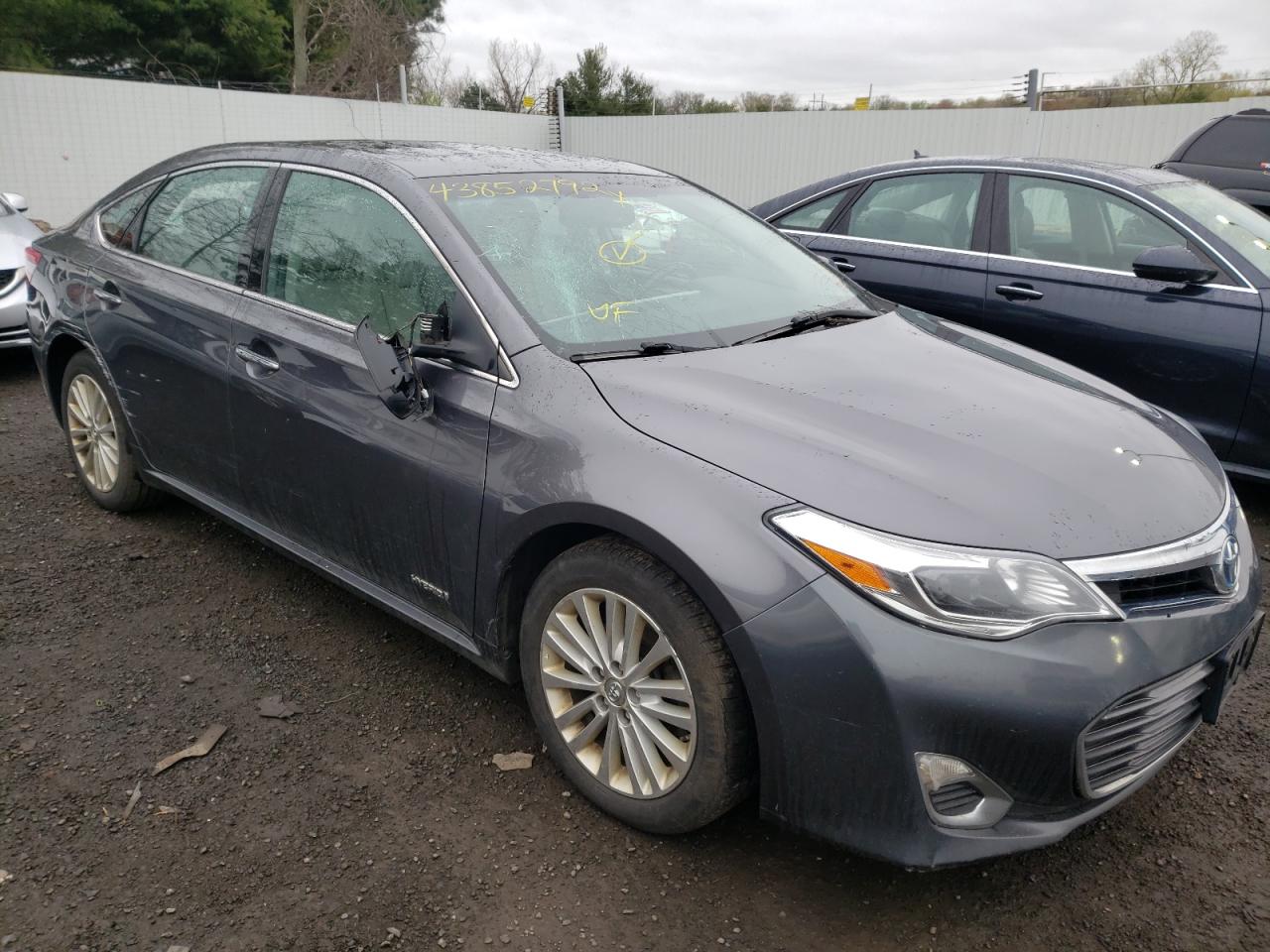 TOYOTA AVALON HYB 2015 with VIN 4T1BD1EB7FU043583 - Photo from auction