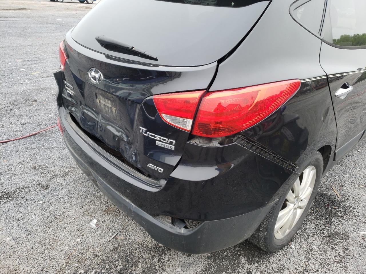 Photo 9 from auction – 2011 HYUNDAI TUCSON GLS with VIN KM8JUCAC8BU281474
