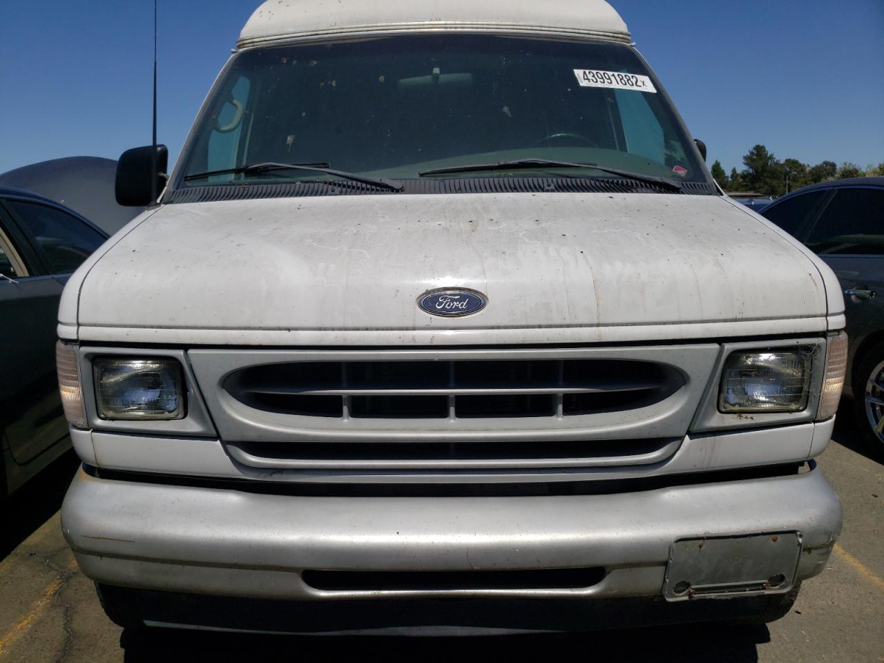 Photo 9 from auction – 2001 FORD ECONOLINE with VIN 1FBSS31F21HB74859