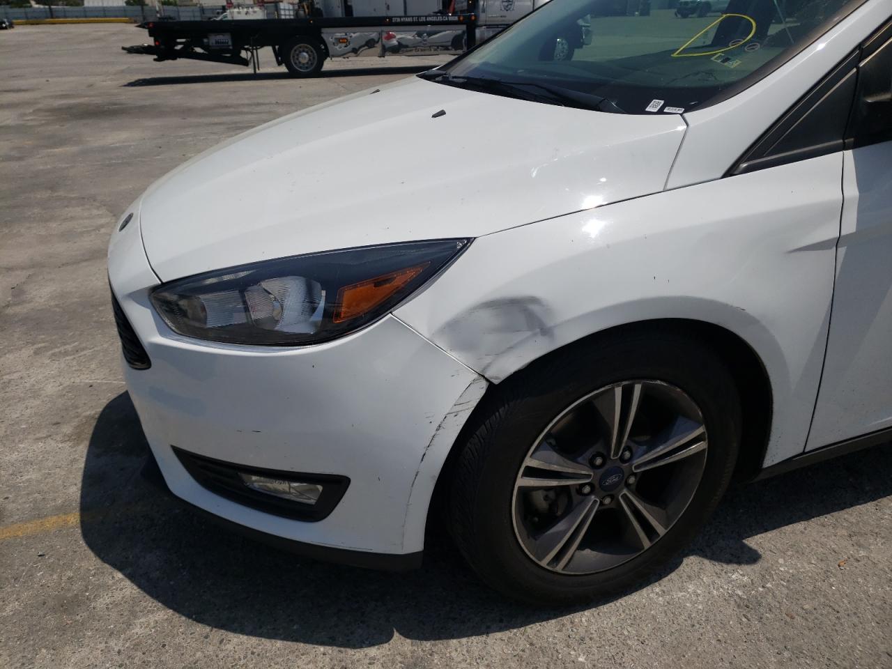 Photo 9 from auction – 2018 FORD FOCUS SE with VIN 1FADP3FE9JL270643