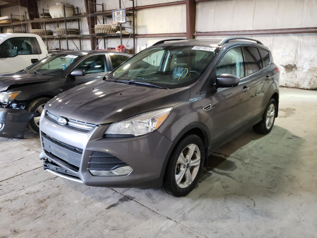 Photo 2 from auction – 2014 FORD ESCAPE SE with VIN 1FMCU9GX6EUA59560